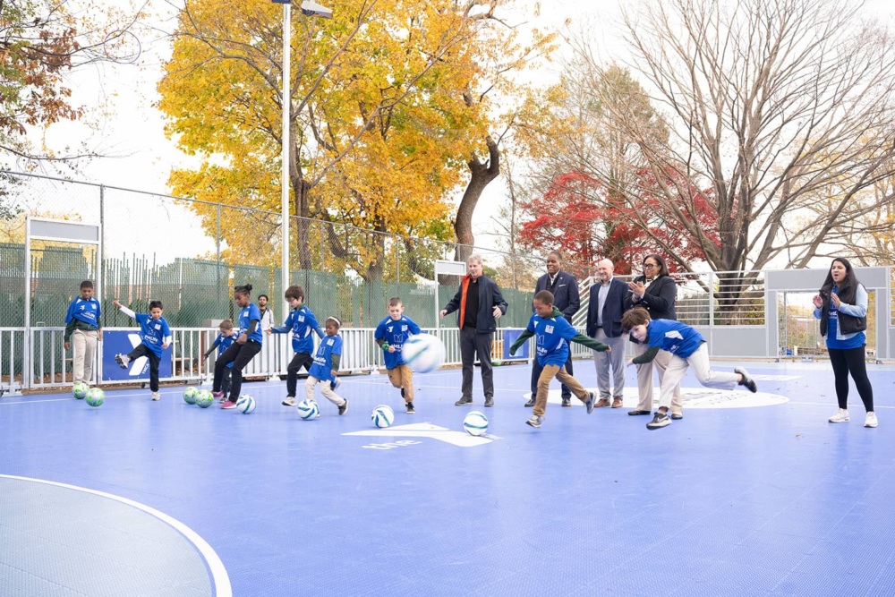 Ceremonial first kick at the opening of a mini-pitch in Roxborough, PA.